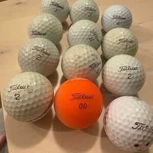 Titleist Golf Balls Set with Orange Accent